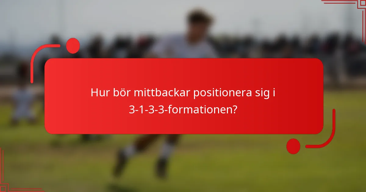 Hur bör mittbackar positionera sig i 3-1-3-3-formationen?
