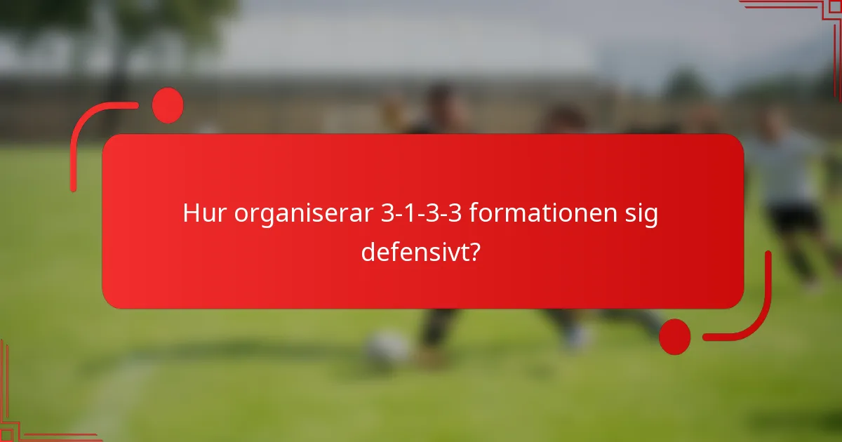 Hur organiserar 3-1-3-3 formationen sig defensivt?
